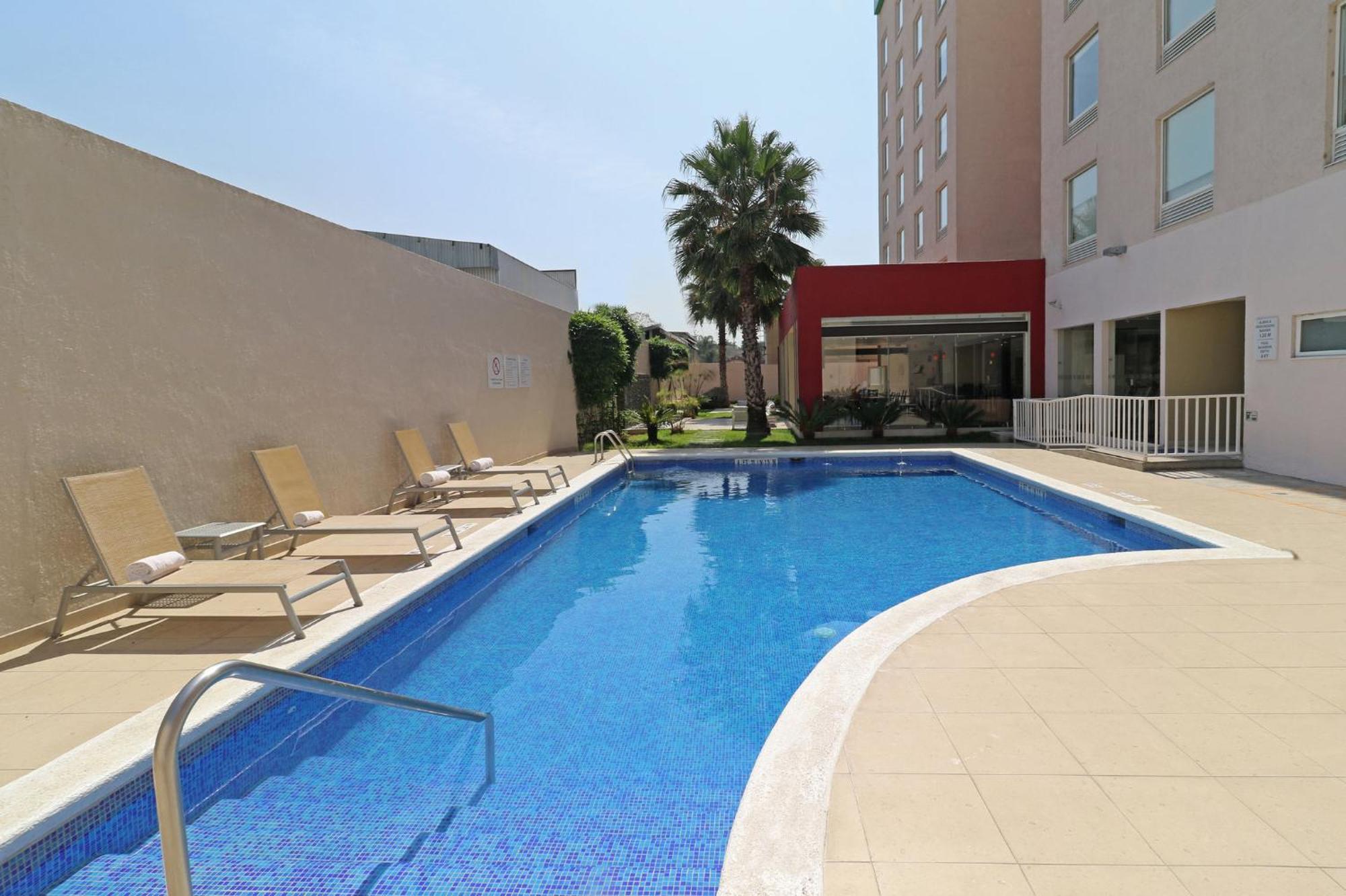 Holiday Inn Express Guadalajara Aeropuerto By Ihg Las Pintas Eksteriør bilde